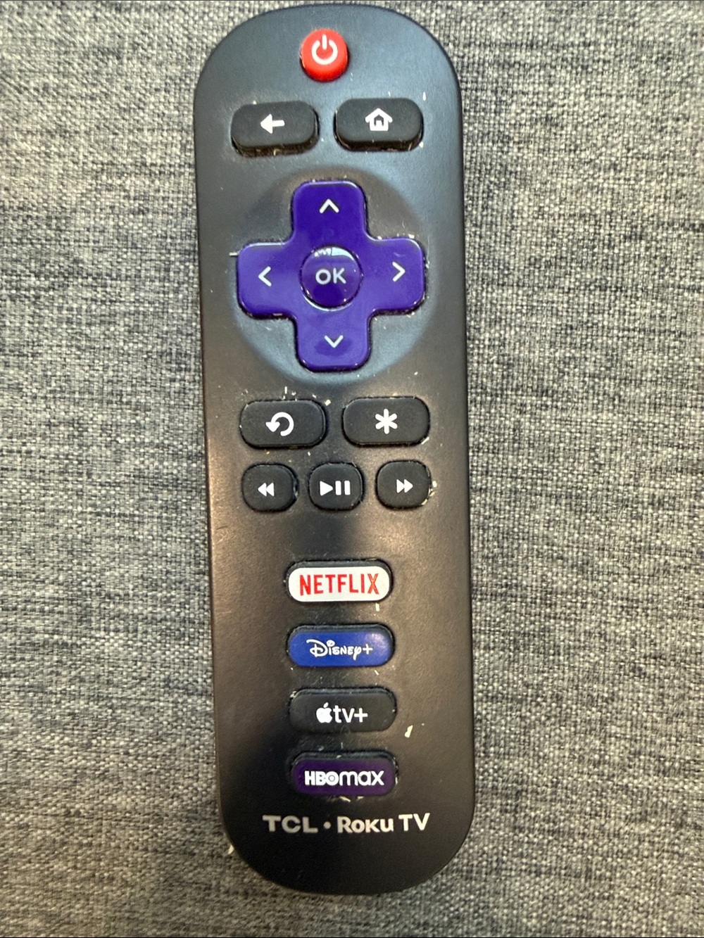 TCL Black Remote with Purple Directional Pad and Red Power Button